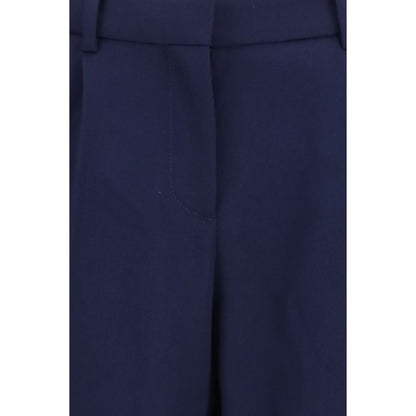 Pants by Balenciaga for women in merino wool twill blue showcases a unrivaled comfort silhouette, featuring a regular-fit & slim cut and long with a for a unrivaled comfort and refined aesthetic.