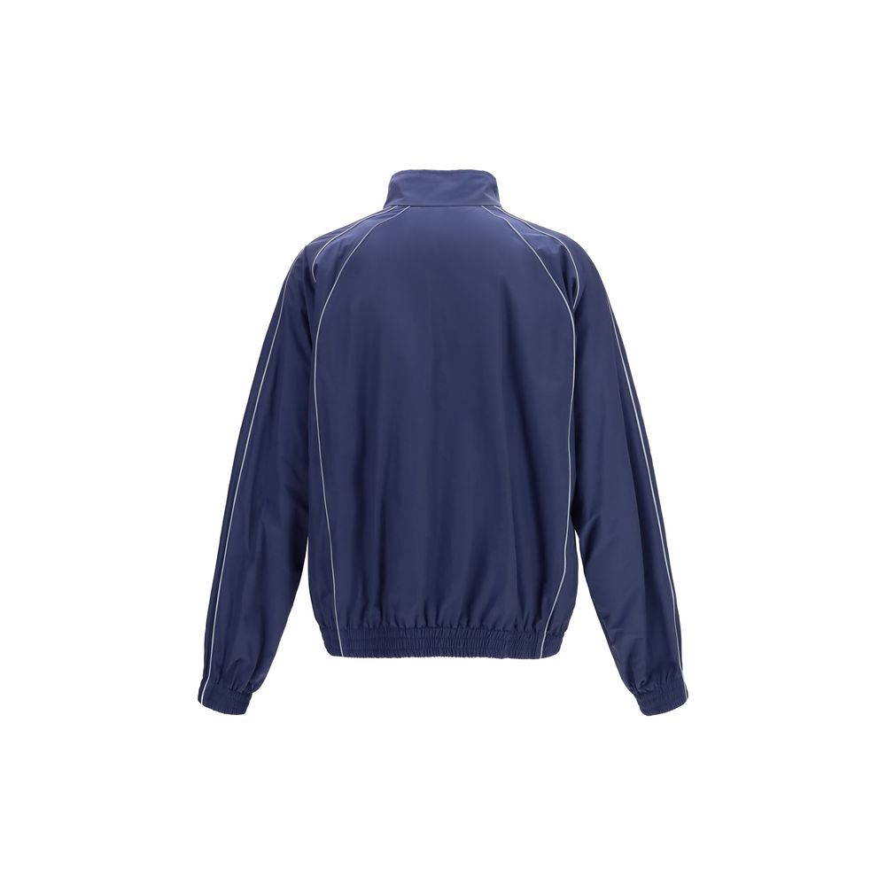 Track Jacket by Balenciaga for men in polyamide cotton blue & signature features an relaxed-luxury silhouette, showcasing a sophisticated high-neck neckline and premium pockets & windproof for a truly relaxed-luxury look.