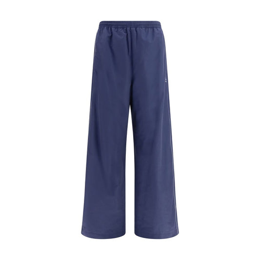 Activewear Pants by Balenciaga for men in polyamide cotton blue & print features an streamlined design with reflective, highlighting a streamlined athletic & regular-fit and long cut with a comfortable mid rise.