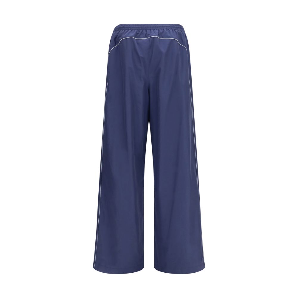 Activewear Pants by Balenciaga for men in polyamide cotton blue & print features a ergonomic athletic & regular-fit and mid rise with a ergonomic long, showcasing innovative reflective for a ergonomic look.