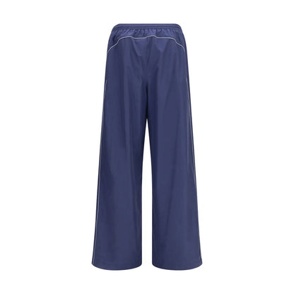 Activewear Pants by Balenciaga for men in polyamide cotton blue & print features a ergonomic athletic & regular-fit and mid rise with a ergonomic long, showcasing innovative reflective for a ergonomic look.