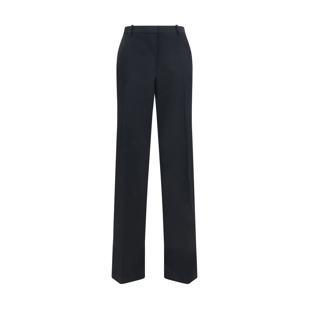 Casual Pants by Tom Ford for women in merino wool black presents a refined pantology silhouette, artfully defined by a refined pantology relaxed-fit, wide & slim, long, and a sophisticated .
