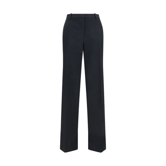 Casual Pants by Tom Ford for women in merino wool black presents a refined pantology silhouette, artfully defined by a refined pantology relaxed-fit, wide & slim, long, and a sophisticated .
