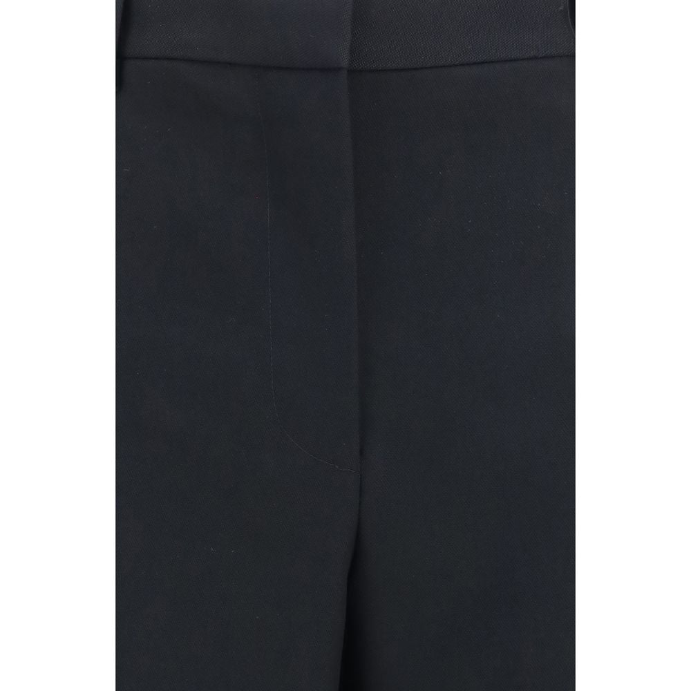 Casual Pants by Tom Ford for women in merino wool black features an sartorial relaxed-fit, wide & slim and long with a cut for a sartorial finish.