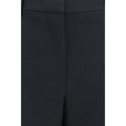 Casual Pants by Tom Ford for women in merino wool black features an sartorial relaxed-fit, wide & slim and long with a cut for a sartorial finish.