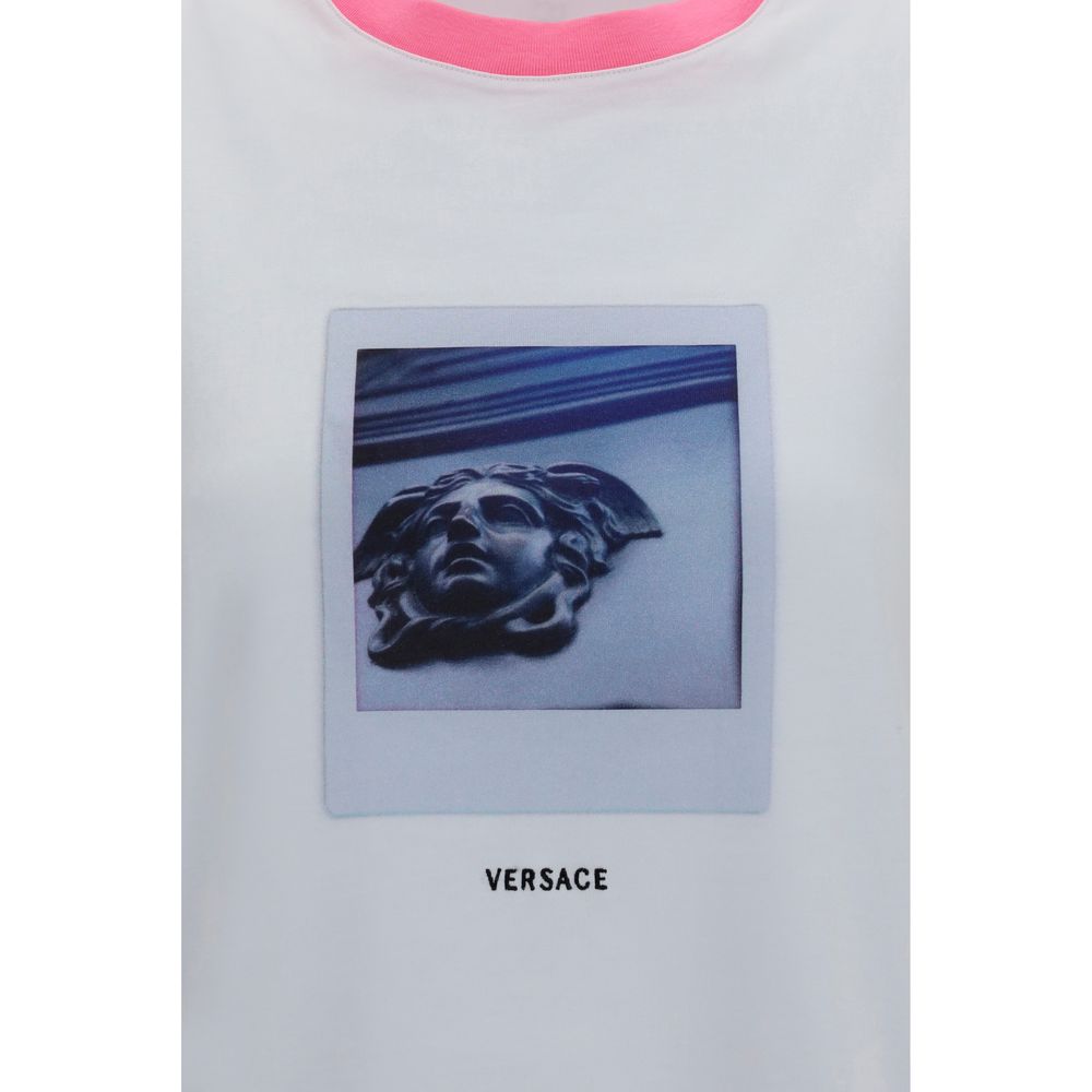 T-Shirt by Versace for women in cotton white & print features an on trend silhouette, perfectly showcasing a on trend and for an elevated aesthetic.