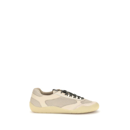 Athletic Sneakers by Prada for men in bos taurus calf leather & polyester beige & patterned presents a sleek silhouette, perfectly capturing the athletic style essence of Men's Athletic Bos Taurus Calf Leather & Polyester Sneakers with its sleek design and premium finish.