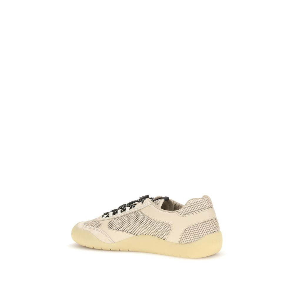 Athletic Sneakers by Prada for men in bos taurus calf leather & polyester beige & patterned showcases a architectural silhouette, artfully capturing the essence of the Men's Athletic Bos Taurus Calf Leather & Polyester Sneakers with its signature architectural athletic style construction.