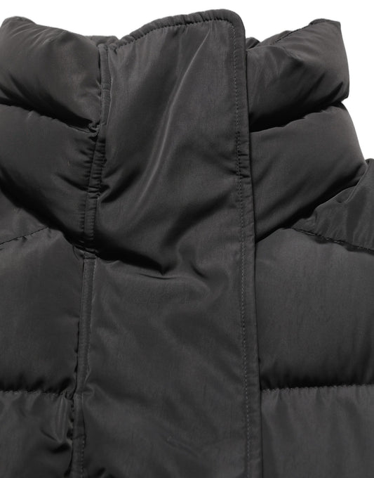 Puffer Jacket by Dolce & Gabbana for women in nylon & polyester black features a city-ready silhouette, detailed with insulated and a city-ready wrap neckline.