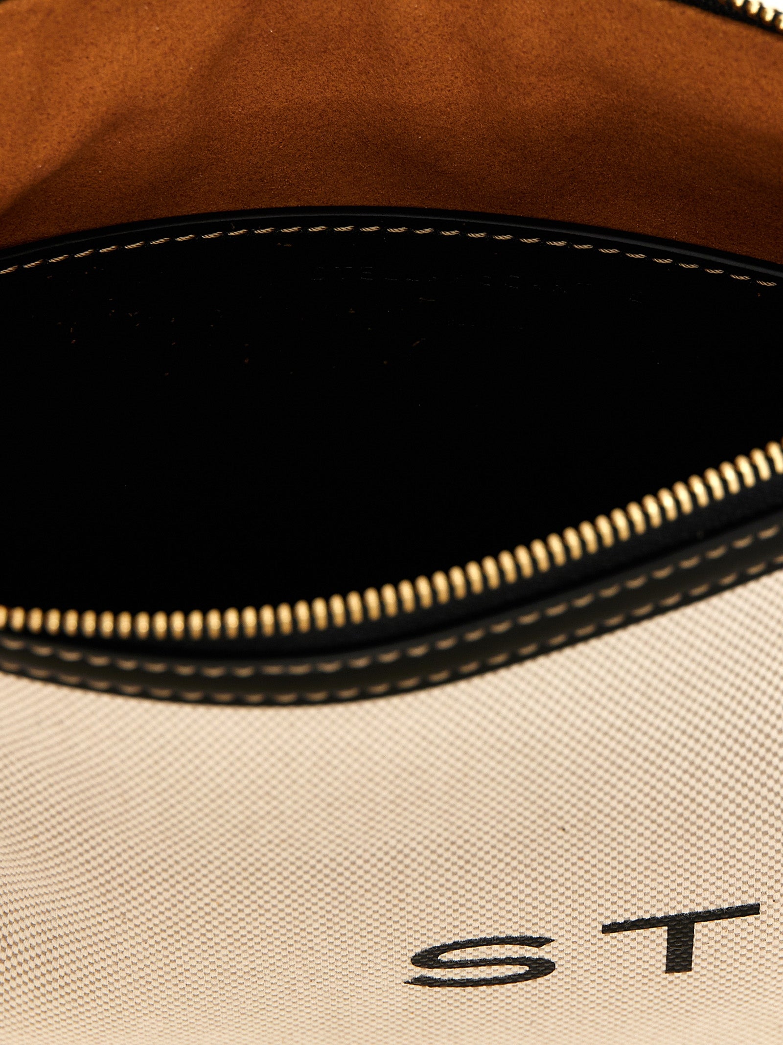 Evening Clutch Handbag by Stella McCartney for women in cotton polyester beige & print features a sculptural silhouette with a secure zipper, ample , and versatile wristlet & handle for a sculptural finish.