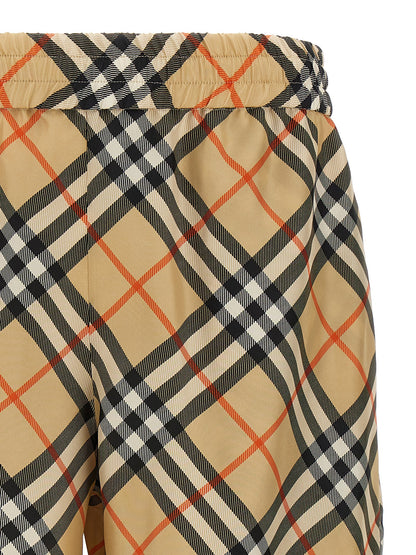 Bermuda Shorts by Burberry for men in silk satin beige & print features an tailored silhouette, showcasing a tailored with a short and for a sophisticated look.