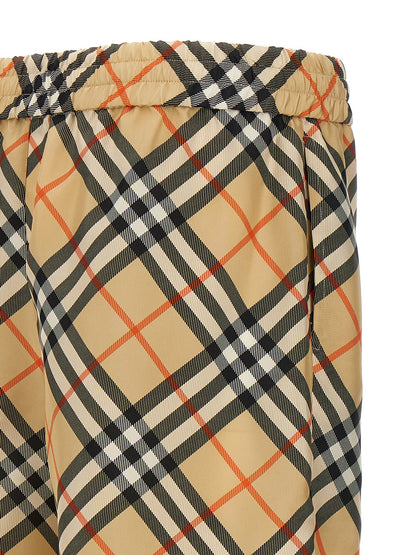 Bermuda Shorts by Burberry for men in silk satin beige & print presents a sleek silhouette, featuring a sleek with a refined short and a sophisticated .
