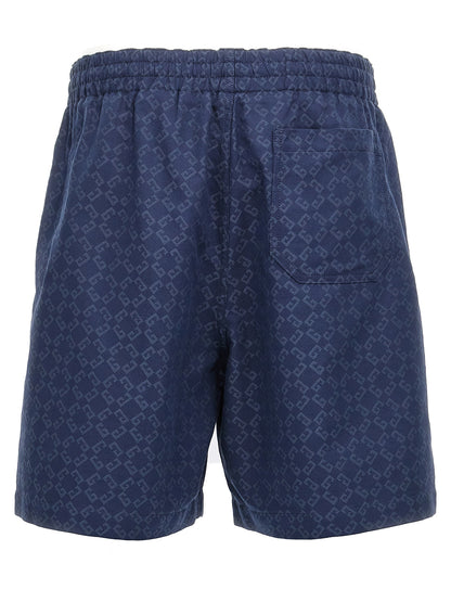 Bermuda Shorts by Givenchy for men in viscose cotton blue, jacquard & monogram features an nuanced silhouette, showcasing a nuanced with a short cut and for a sophisticated, premium finish.
