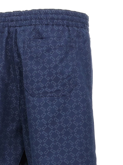 Bermuda Shorts by Givenchy for men in viscose cotton blue, jacquard & monogram showcases a on trend silhouette, featuring a tailored with a classic short and sophisticated for a on trend finish.