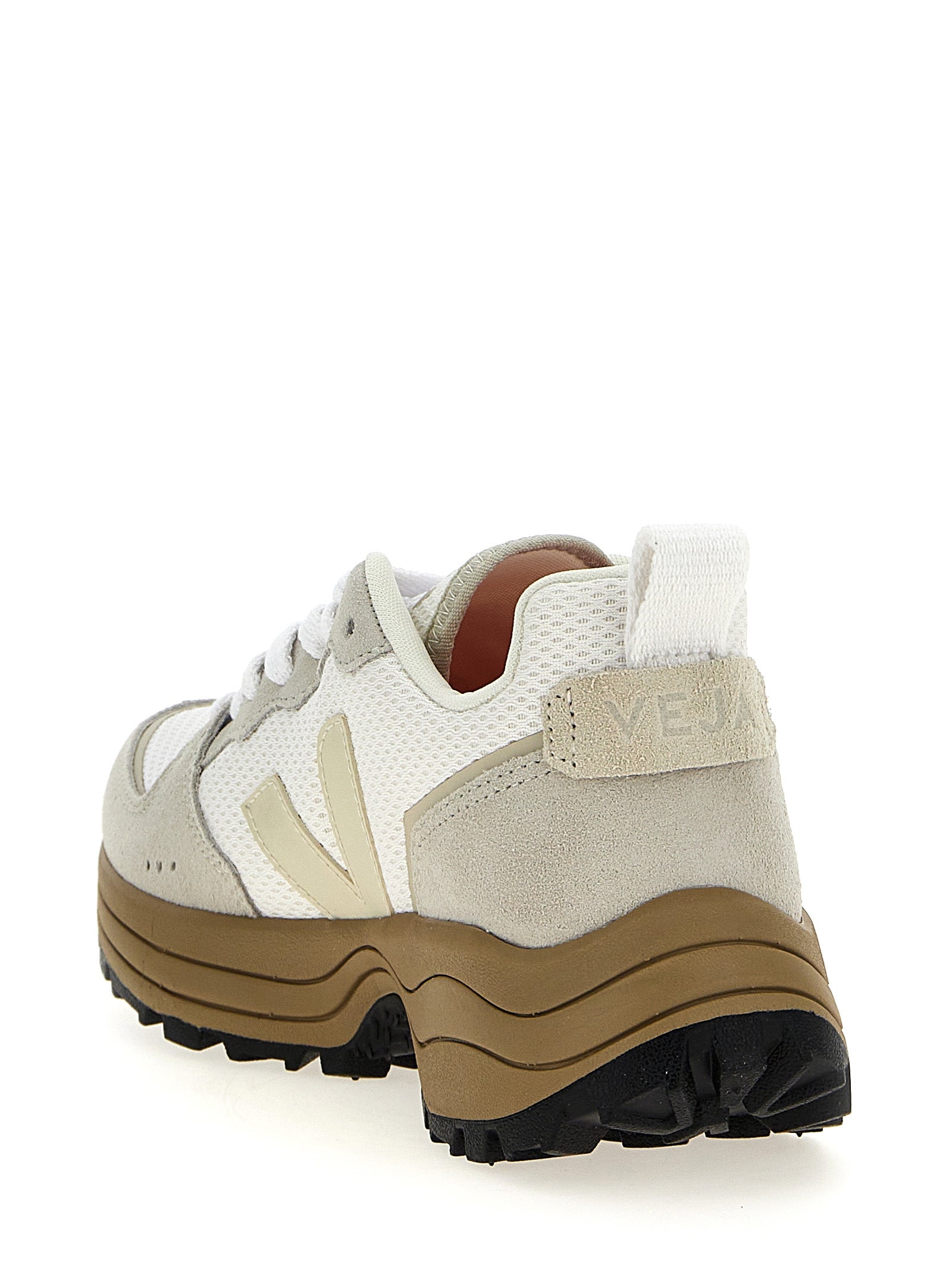 Athletic Sneakers by Veja for women in polyester eva tu suede leather beige & signature showcases a architectural silhouette, artfully capturing the essence of the Women's Athletic Polyester EVA TU Suede Leather Sneakers with its signature architectural athletic style construction.