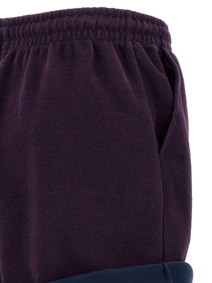 Bermuda Shorts by The Attico for women in cotton purple presents a sleek silhouette, featuring a sleek with a refined short and a sophisticated .