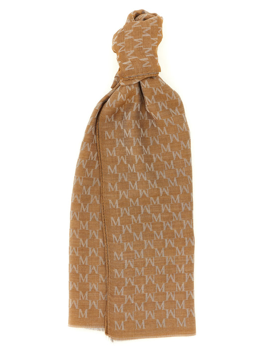 Scarf by Max Mara for women in cotton silk & wool brown, patterned, jacquard & monogram showcases a on trend silhouette, artfully capturing the on trend essence of the Cotton Silk & Wool Foulard Stole Wrap Fringes Scarf design with a sophisticated finish.