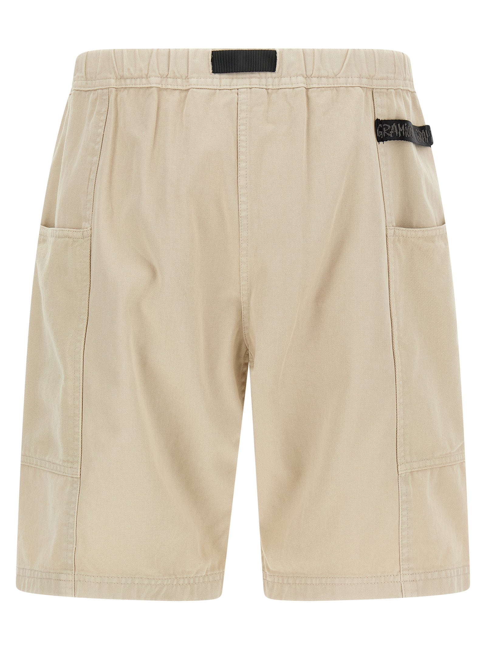 Bermuda Shorts by Gramicci for men in canvas cotton twill beige & signature features an nuanced silhouette, showcasing a nuanced with a short cut and for a sophisticated, premium finish.