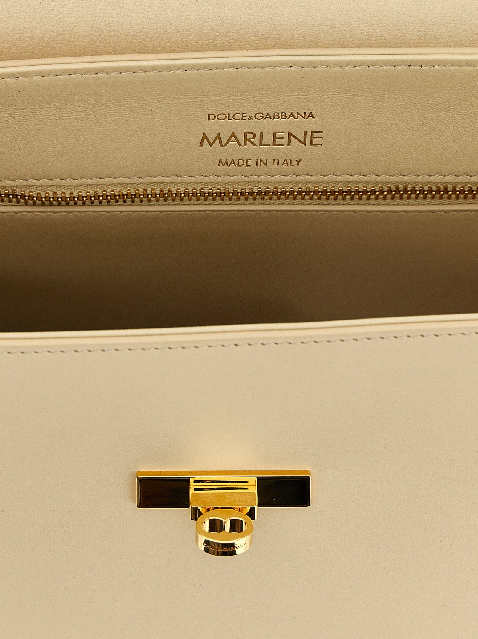 Flap Handbag by Dolce & Gabbana for women in brass crystal & calf leather white features an refined silhouette, showcasing a secure flap, ample , and versatile shoulder-strap, adjustable-strap & handle for a sophisticated refined aesthetic.