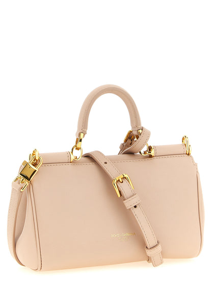 Mini Flap Handbag by Dolce & Gabbana for women in bos taurus calf suede leather multicolor & pink features a signature silhouette, showcasing a secure flap and signature with versatile shoulder-strap, adjustable-strap & handle for a sophisticated look.