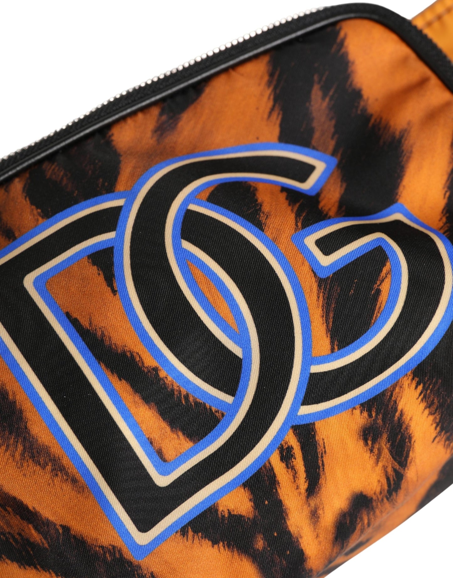 Fanny Pack Belt Bag by Dolce & Gabbana for men in calf leather blue, brown, silver & print presents a jet-setting Calf Leather Fanny Pack Belt Bag design with a secure zipper, ample , and versatile belt-strap for a jet-setting finish.