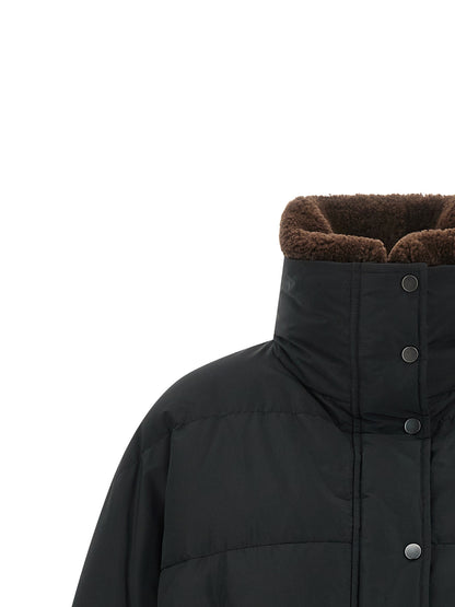 Puffer Jacket by Brunello Cucinelli for women in cotton polyester black presents a effortlessly chic silhouette, showcasing a sophisticated high-neck neckline and premium breathable-design, pockets & insulated for a truly effortlessly chic finish.