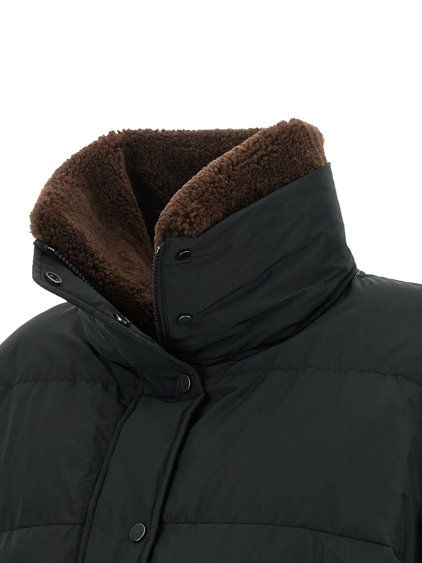 This Puffer Jacket by Brunello Cucinelli for women in cotton polyester black exhibits a edgy silhouette, meticulously detailed with functional breathable-design, pockets & insulated and a edgy high-neck neckline for a edgy finish.
