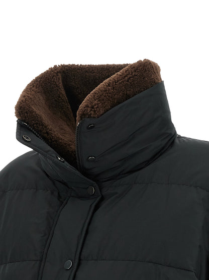 This Puffer Jacket by Brunello Cucinelli for women in cotton polyester black exhibits a edgy silhouette, meticulously detailed with functional breathable-design, pockets & insulated and a edgy high-neck neckline for a edgy finish.