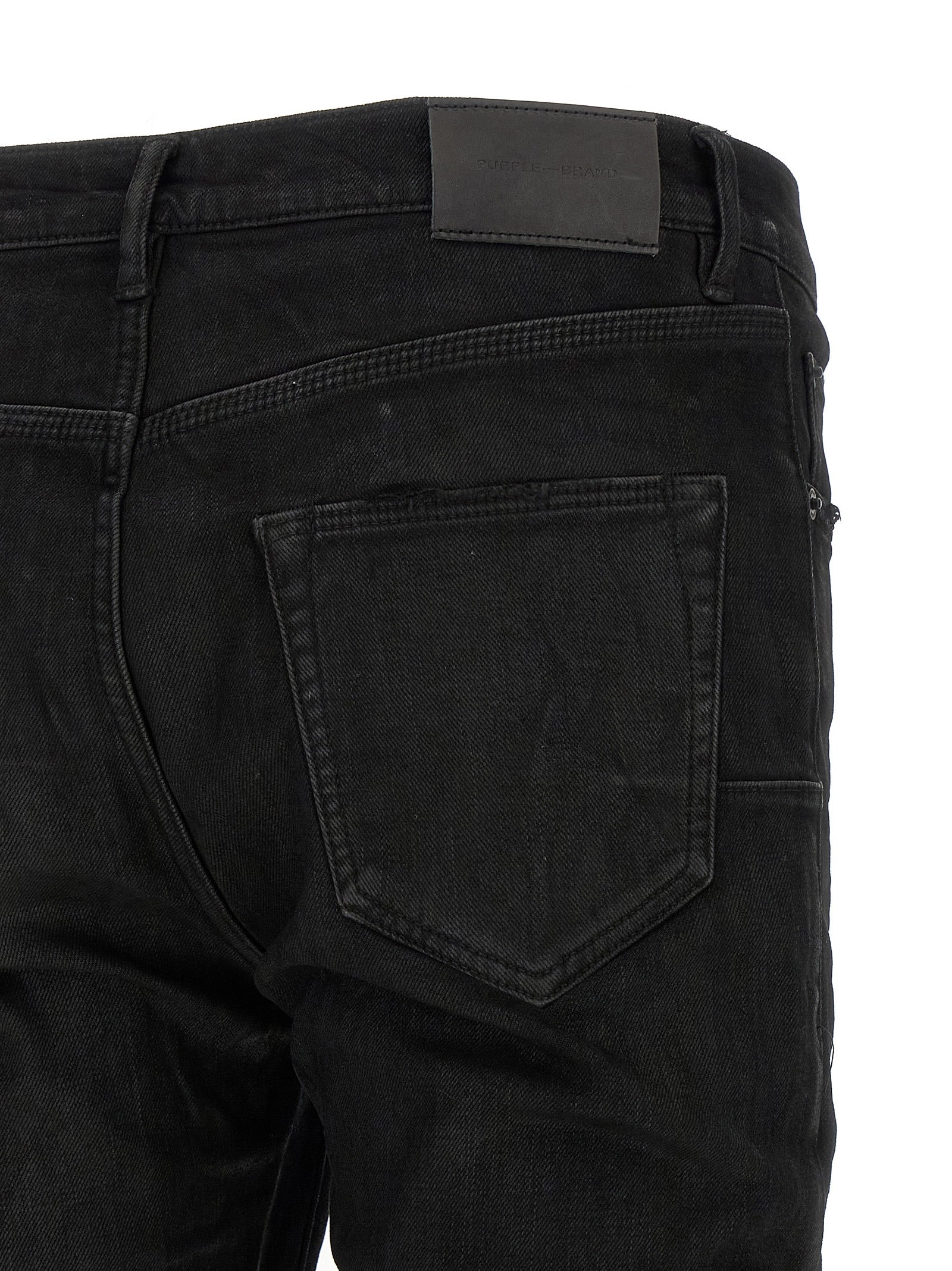 Jeans by PURPLE for men in stretch denim cotton & resin black, purple & signature features a polished silhouette with a polished tapered-leg, reaching a polished long and finished with a polished low rise.