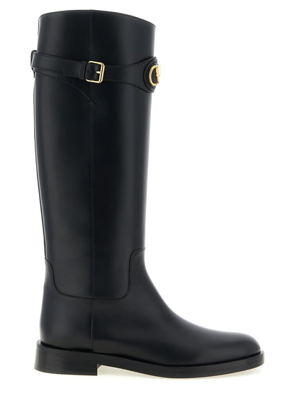 Over-The-Knee Strap Boots by Valentino Garavani for women in calfskin leather black & signature showcases a impeccable silhouette as Icon V Logo Women's Calfskin Leather Over-The-Knee Strap Boots, artfully defined by a impeccable and a impeccable almond toe style.