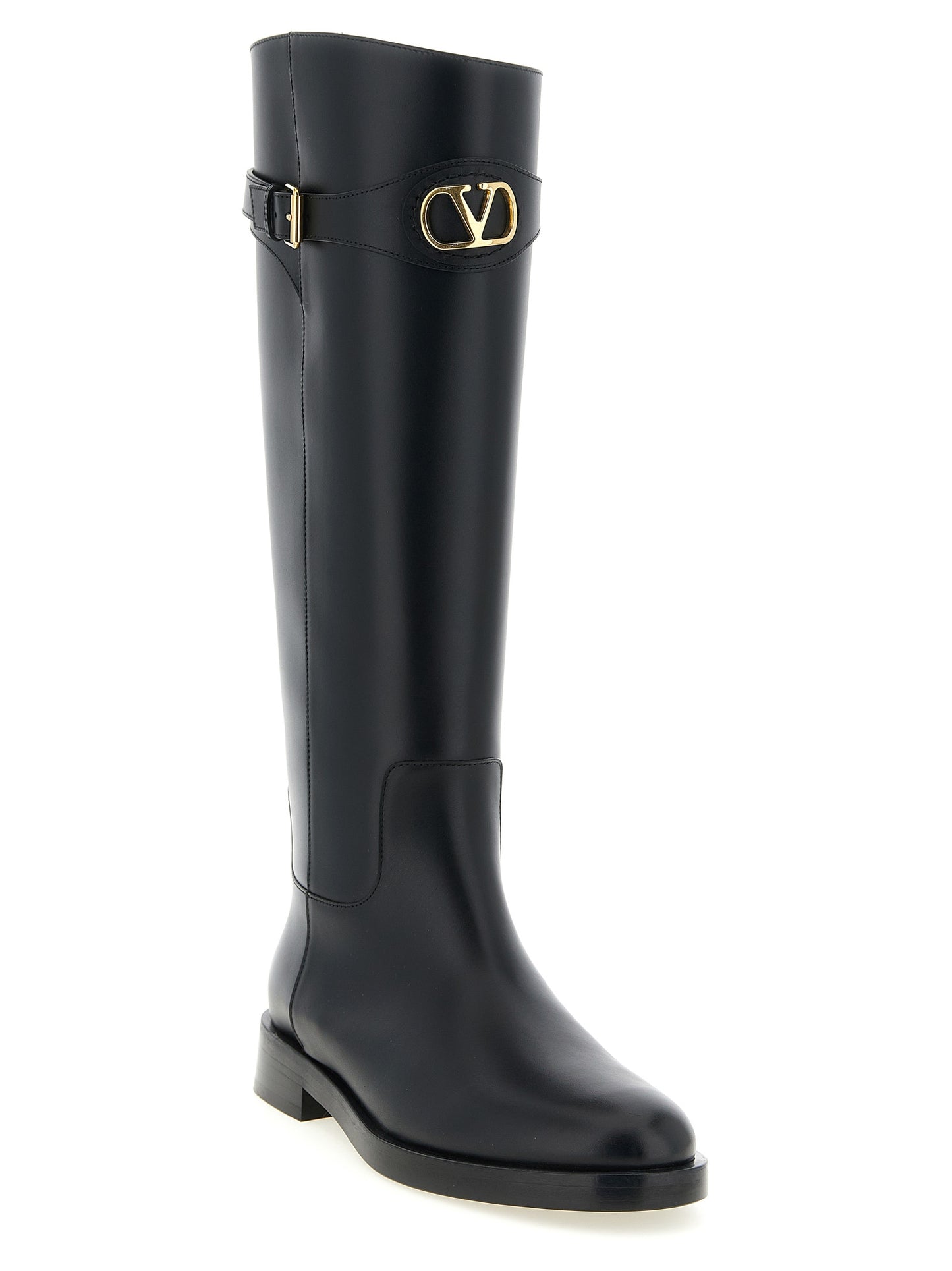 Over-The-Knee Strap Boots by Valentino Garavani for women in calfskin leather black & signature features an avant-garde Icon V Logo Women's Calfskin Leather Over-The-Knee Strap Boots silhouette, defined by a sophisticated and a avant-garde almond toe style.