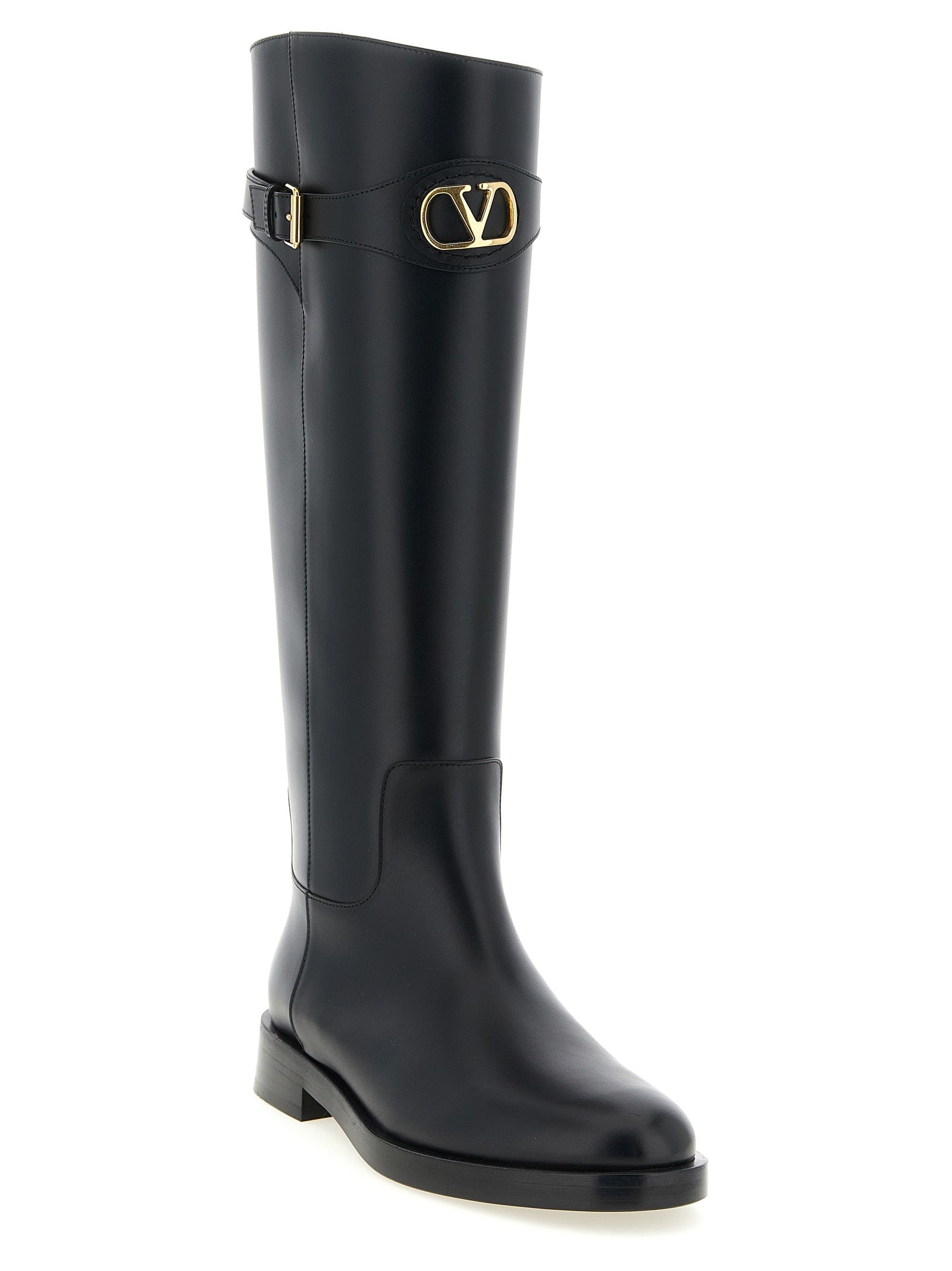 Over-The-Knee Strap Boots by Valentino Garavani for women in calfskin leather black & signature features an avant-garde Icon V Logo Women's Calfskin Leather Over-The-Knee Strap Boots silhouette, defined by a sophisticated and a avant-garde almond toe style.