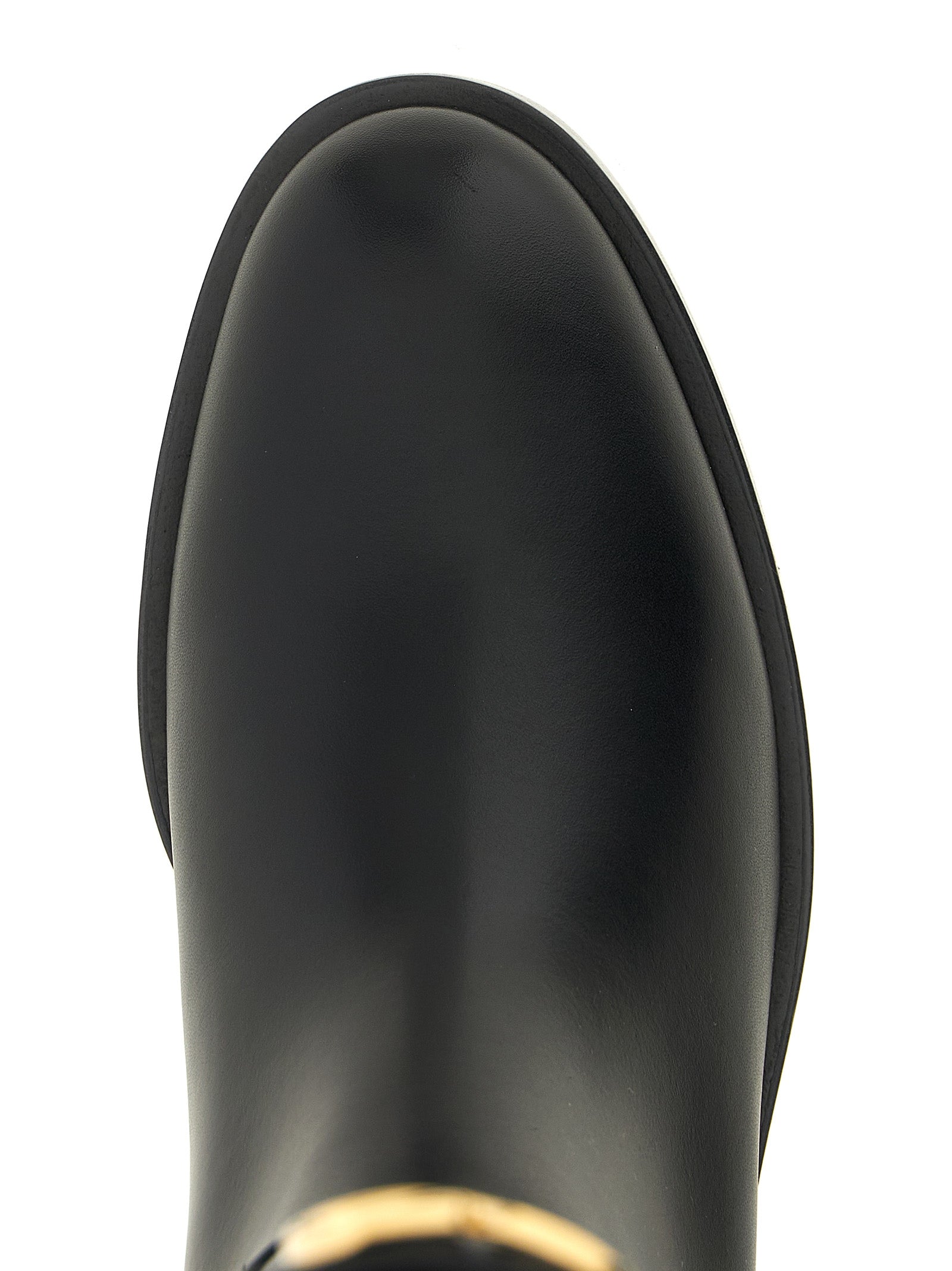 Over-The-Knee Strap Boots by Valentino Garavani for women in calfskin leather black & signature features an enchanting design from the Icon V Logo Women's Calfskin Leather Over-The-Knee Strap Boots collection, highlighting a enchanting and almond toe style for a refined look.