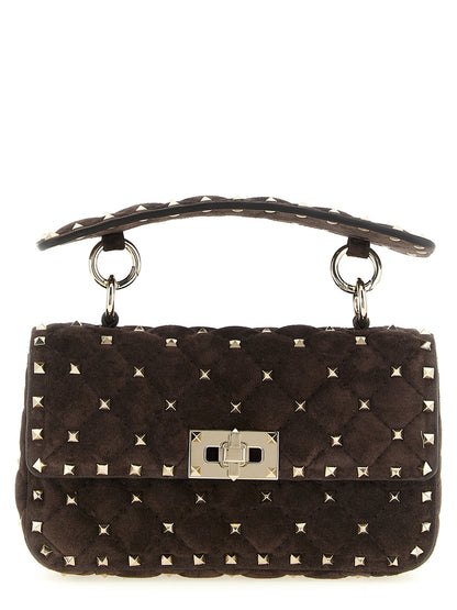 Small Shoulder Flap Bag by Valentino Garavani for women in suede calfskin leather brown showcases a enviable silhouette, artfully detailed with a secure flap, organized , and versatile shoulder-strap, detachable-strap & handle for a enviable look.