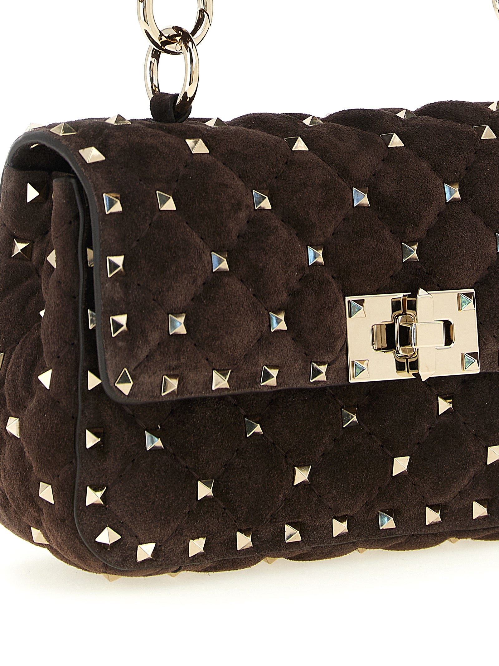 Small Shoulder Flap Bag by Valentino Garavani for women in suede calfskin leather brown features a distinguished silhouette, showcasing a secure flap and distinguished with versatile shoulder-strap, detachable-strap & handle for a distinguished finish.