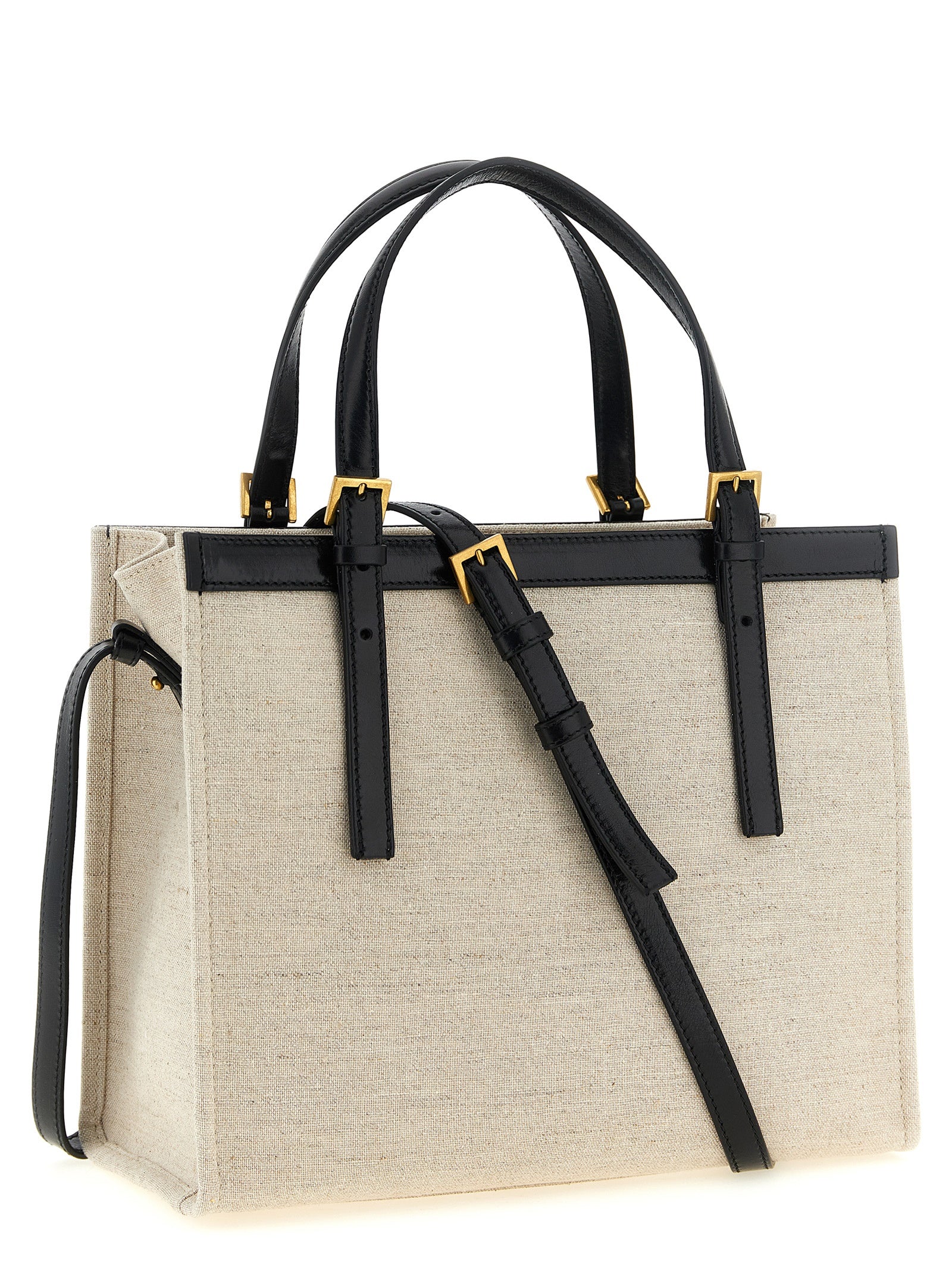 This Medium Shopper Tote Bag by Versace for women in suede calfskin leather & cotton canvas beige & print features an on trend Medusa Riviere Suede Calfskin Leather & Cotton Canvas Medium Shopper Tote Bag design with a secure , ample built-in-compartments, and on trend shoulder-strap, handle & adjustable-strap.