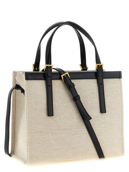This Medium Shopper Tote Bag by Versace for women in suede calfskin leather & cotton canvas beige & print features an on trend Medusa Riviere Suede Calfskin Leather & Cotton Canvas Medium Shopper Tote Bag design with a secure , ample built-in-compartments, and on trend shoulder-strap, handle & adjustable-strap.