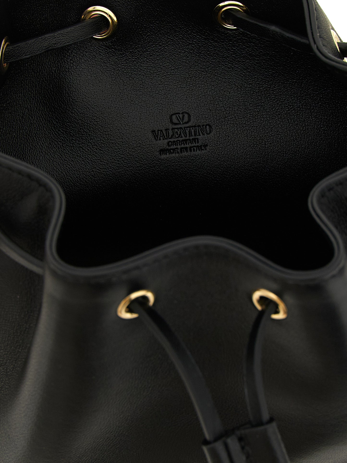 Crossbody Bucket Handbag by Valentino Garavani for women in lamb leather black & signature showcases a versatile sophistication silhouette, featuring a secure drawstring, versatile sophistication , and versatile crossbody-strap & shoulder-strap for a versatile sophistication finish.