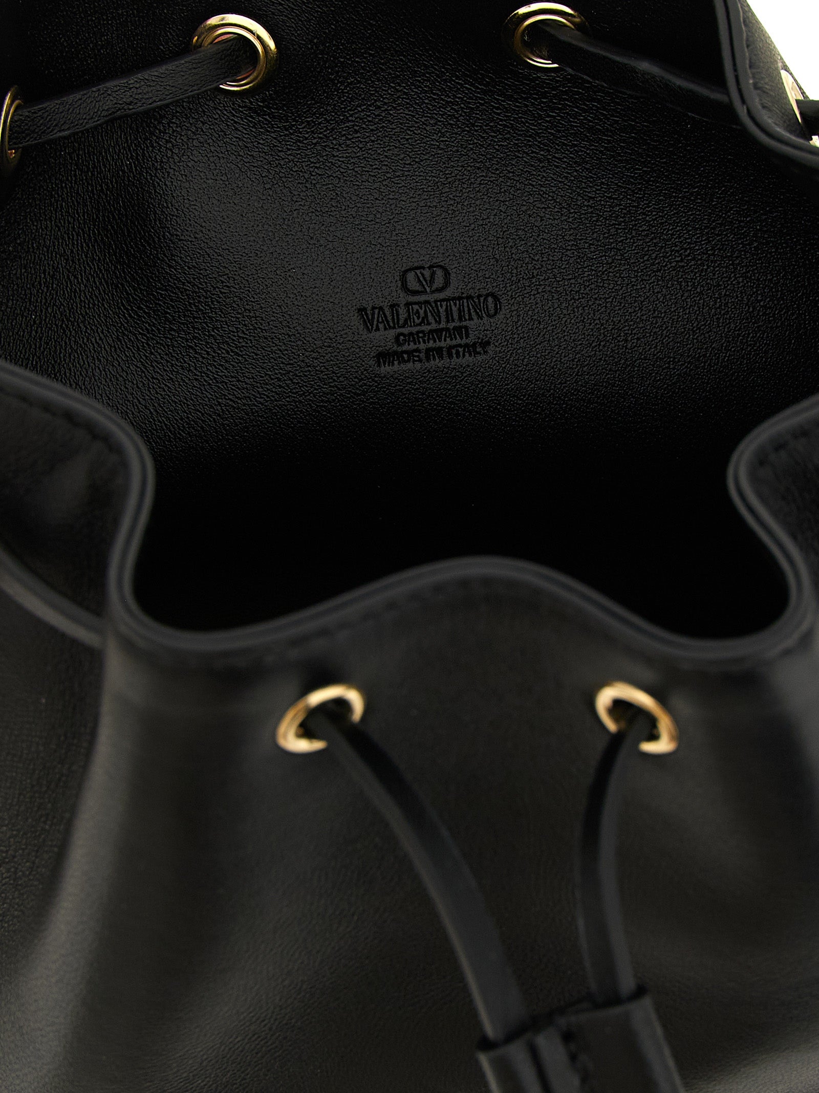 Crossbody Bucket Handbag by Valentino Garavani for women in lamb leather black & signature showcases a versatile sophistication silhouette, featuring a secure drawstring, versatile sophistication , and versatile crossbody-strap & shoulder-strap for a versatile sophistication finish.