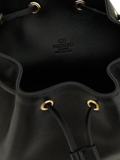 Crossbody Bucket Handbag by Valentino Garavani for women in lamb leather black & signature showcases a versatile sophistication silhouette, featuring a secure drawstring, versatile sophistication , and versatile crossbody-strap & shoulder-strap for a versatile sophistication finish.