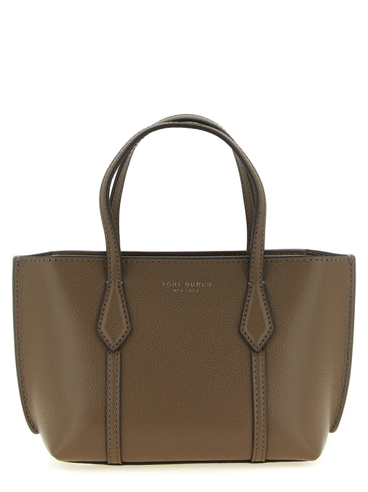 Mini Shopper Tote Bag by Tory Burch for women in leather & cotton brown features a distinguished Perry Leather & Cotton Mini Shopper Tote Bag design, complete with a secure , ample , and versatile shoulder-strap, adjustable-strap & handle for a distinguished look.