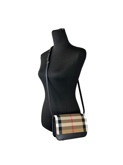 Small Crossbody Handbag by Burberry for women in canvas gold features a transformative sophistication silhouette, showcasing a secure , ample , and versatile crossbody-strap & adjustable-strap for a transformative sophistication look.
