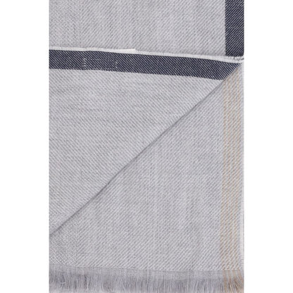 Scarf by Brunello Cucinelli for men in cashmere wool gray & patterned showcases a warm silhouette from the Cashmere Wool Wrap Frayed-Edge Scarf collection, offering a warm drape that exudes sophisticated luxury.
