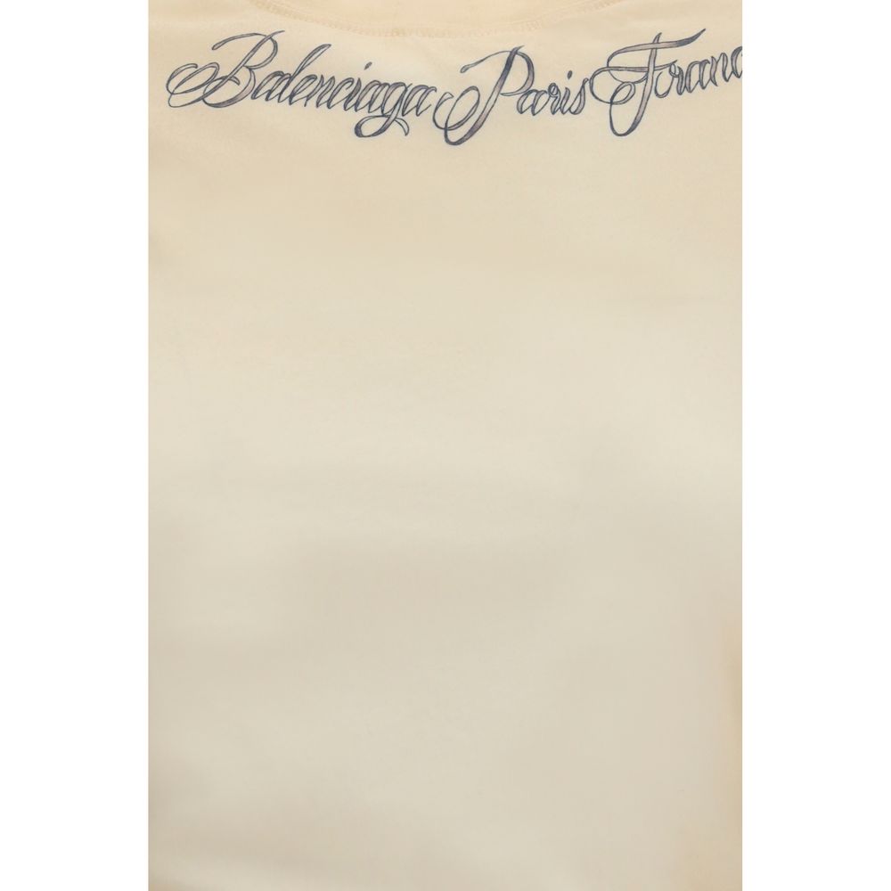 T-Shirt by Balenciaga for women in cotton beige & print showcases a chic silhouette, artfully detailed with a chic and for a chic finish.