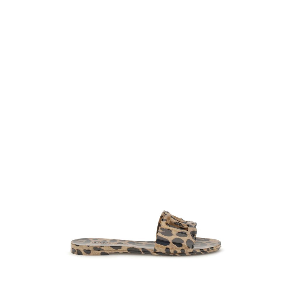 Flat Sandals by Dolce & Gabbana for women in thermoplastic polyurethane animal, multicolor, leopard-print, patterned & print features an architectural design from the Women's Thermoplastic Polyurethane Flat Sandals collection, defined by a architectural flat and for a architectural finish.