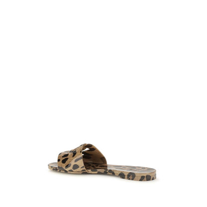 Flat Sandals by Dolce & Gabbana for women in thermoplastic polyurethane and animal, multicolor, leopard-print, patterned & print presents a captivating silhouette, showcasing the signature style of the Women's Thermoplastic Polyurethane Flat Sandals with a captivating flat and captivating .