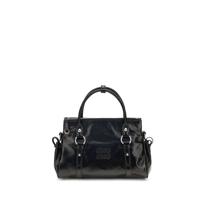 Crossbody Handbag by Miu Miu for women in bos taurus calf leather & plexiglass black features a contemporary silhouette, showcasing a secure zipper, ample , and contemporary crossbody-strap, shoulder-strap, adjustable-strap & handle for a sophisticated look.