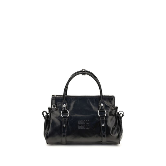 Crossbody Handbag by Miu Miu for women in bos taurus calf leather & plexiglass black features a contemporary silhouette, showcasing a secure zipper, ample , and contemporary crossbody-strap, shoulder-strap, adjustable-strap & handle for a sophisticated look.