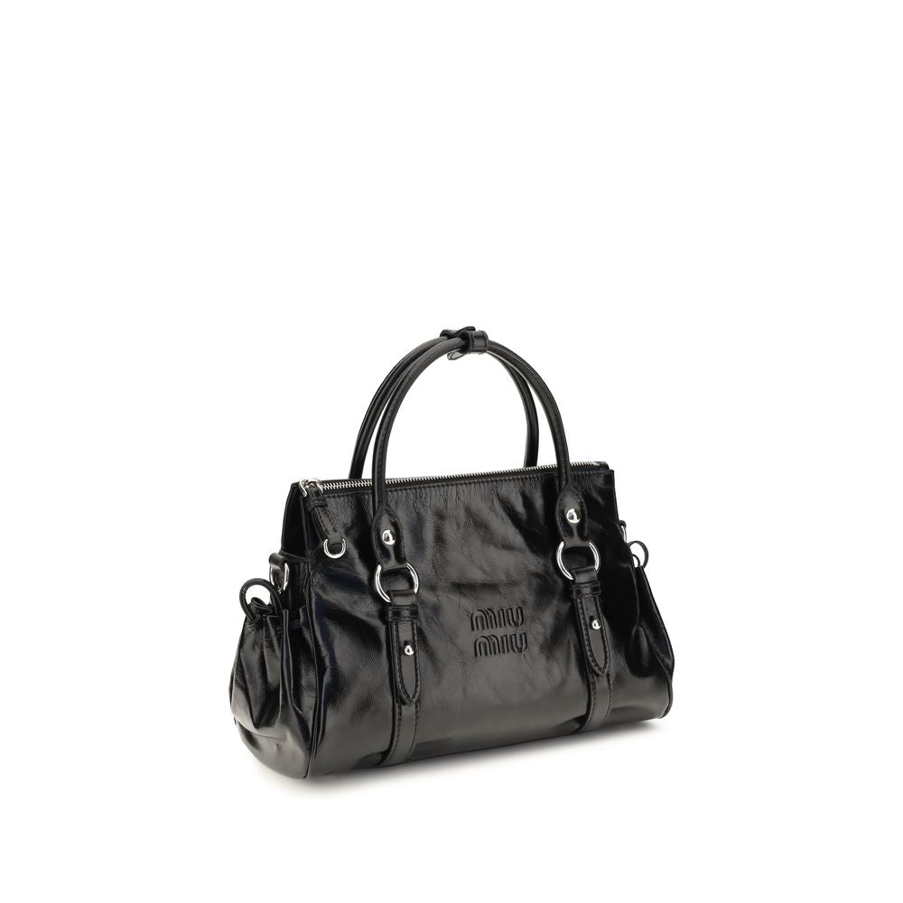 Crossbody Handbag by Miu Miu for women in bos taurus calf leather & plexiglass black presents a ornamental silhouette, showcasing a secure zipper, ample , and versatile crossbody-strap, shoulder-strap, adjustable-strap & handle for a ornamental finish.