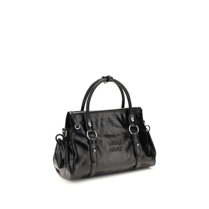 Crossbody Handbag by Miu Miu for women in bos taurus calf leather & plexiglass black presents a ornamental silhouette, showcasing a secure zipper, ample , and versatile crossbody-strap, shoulder-strap, adjustable-strap & handle for a ornamental finish.
